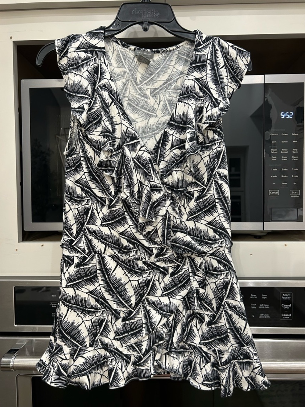 Ann Taylor Ruffled V-Neck Black & White Leaf Print top
